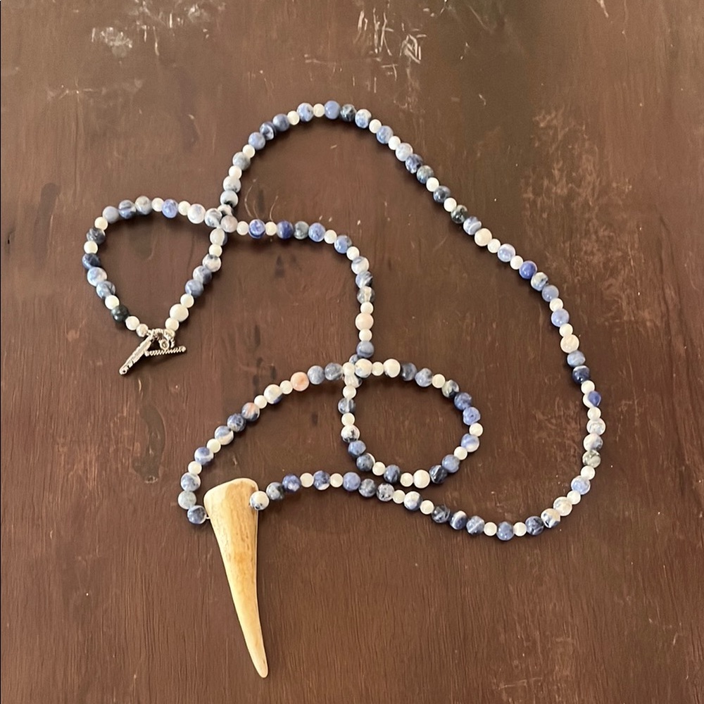 Handmade blue beaded necklace with deer antler